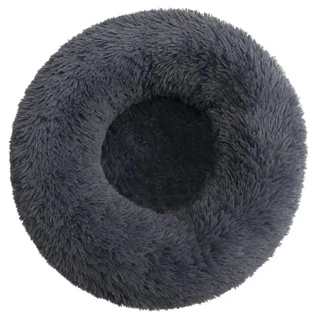Calming Pet Bed - Plush, supportive corduroy lounger for dogs. Reduces anxiety, machine washable.