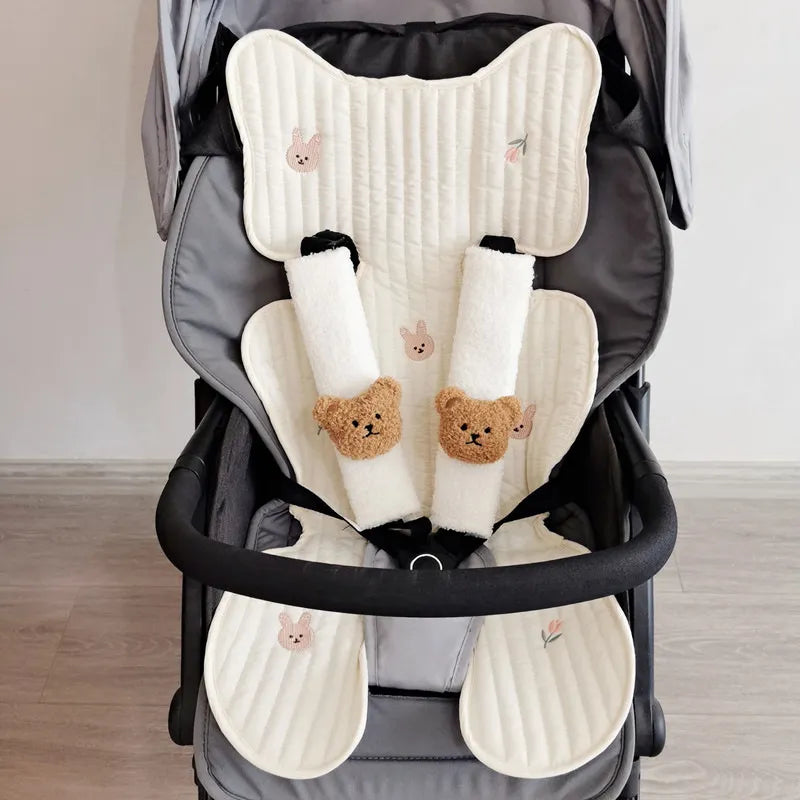Kids' car seat strap wrap, 'Sunny Day' plush, provides a soft barrier against rough straps