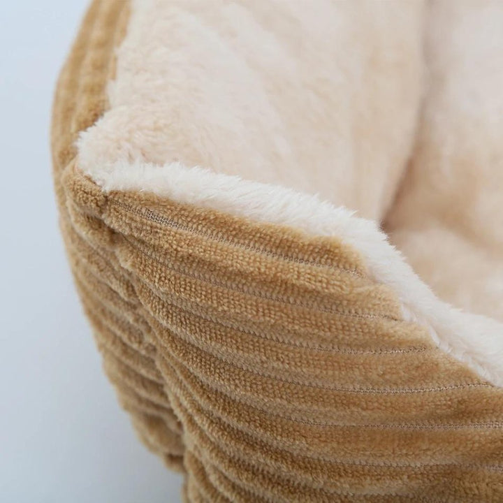 Non-slip plush pet bed, perfect for small to large dogs. Ensures cozy, secure sleep and comfort.