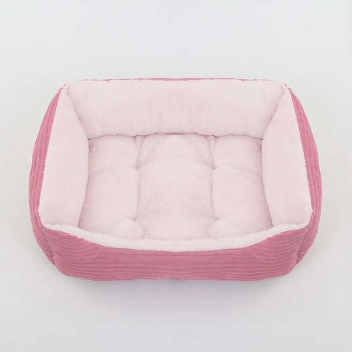 Deluxe plush dog bed offering superior comfort and support for pets. Features a cozy, washable design.