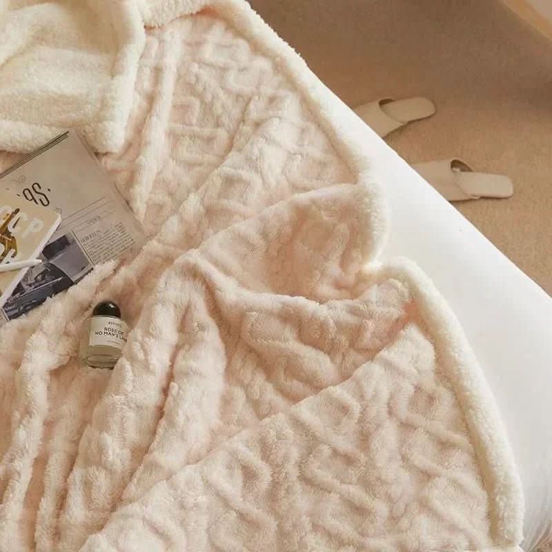 Experience superior warmth with this plush lambswool blanket. Cozy microfiber flannel throw, easy care & durable.