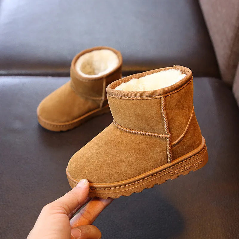Plush-lined blue kids snow boots, perfect for warm winter play in snow for boys and girls.