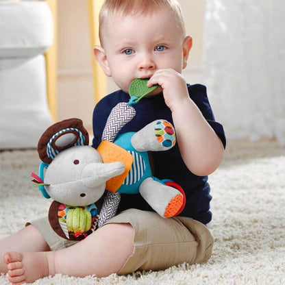 Plush lion rattle doll with crinkle, teether, and textured fabrics for sensory play, attached to a stroller