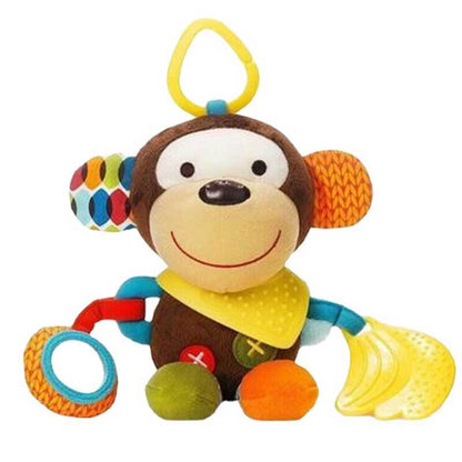 Infant playing with a vibrant owl rattle doll, featuring crinkle sounds and a chewable teether toy