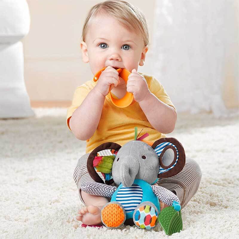 Colorful baby animal multi-sensory rattle dolls hanging on a play gym, enticing infant interaction and teething