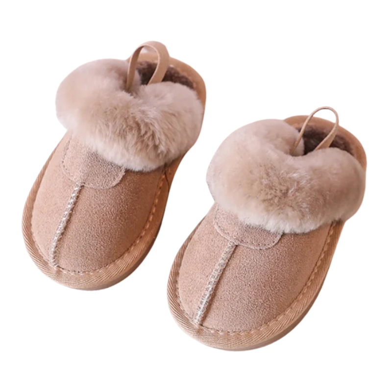 Toddler's comfy purple plush slippers with non-slip soles, great for safe indoor walking.
