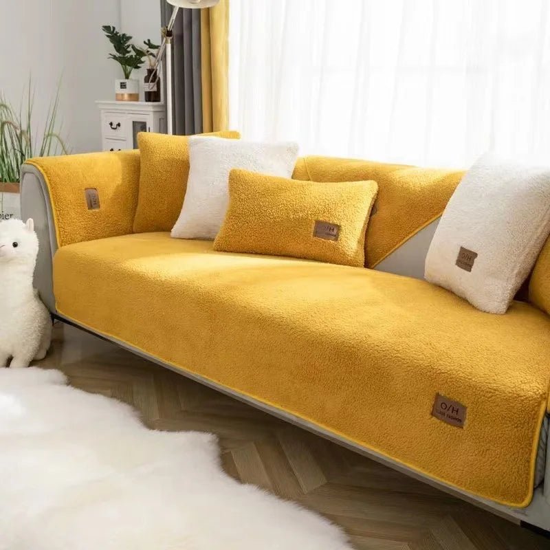 Stylish modern plush sofa cover, a functional and warm furniture protector for your home.