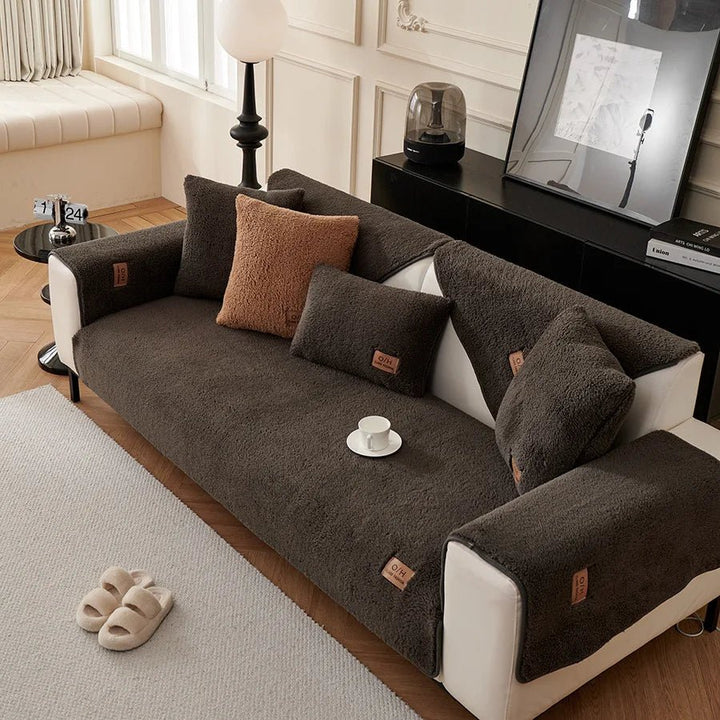 Enhance living room with this modern, plush sofa cover & cozy throw. Great furniture protector.