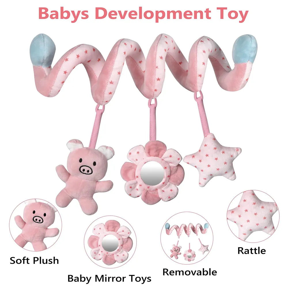 Close-up of the plush elephant rattle on the baby spiral car seat and crib toy