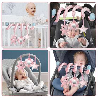 Happy baby in a car seat with the spiral activity toy providing entertainment and development