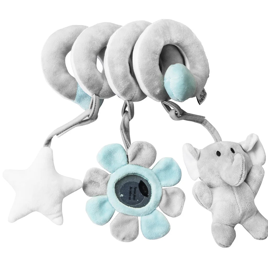 Spiral developmental toy wrapped around a crib rail, offering sensory fun for baby