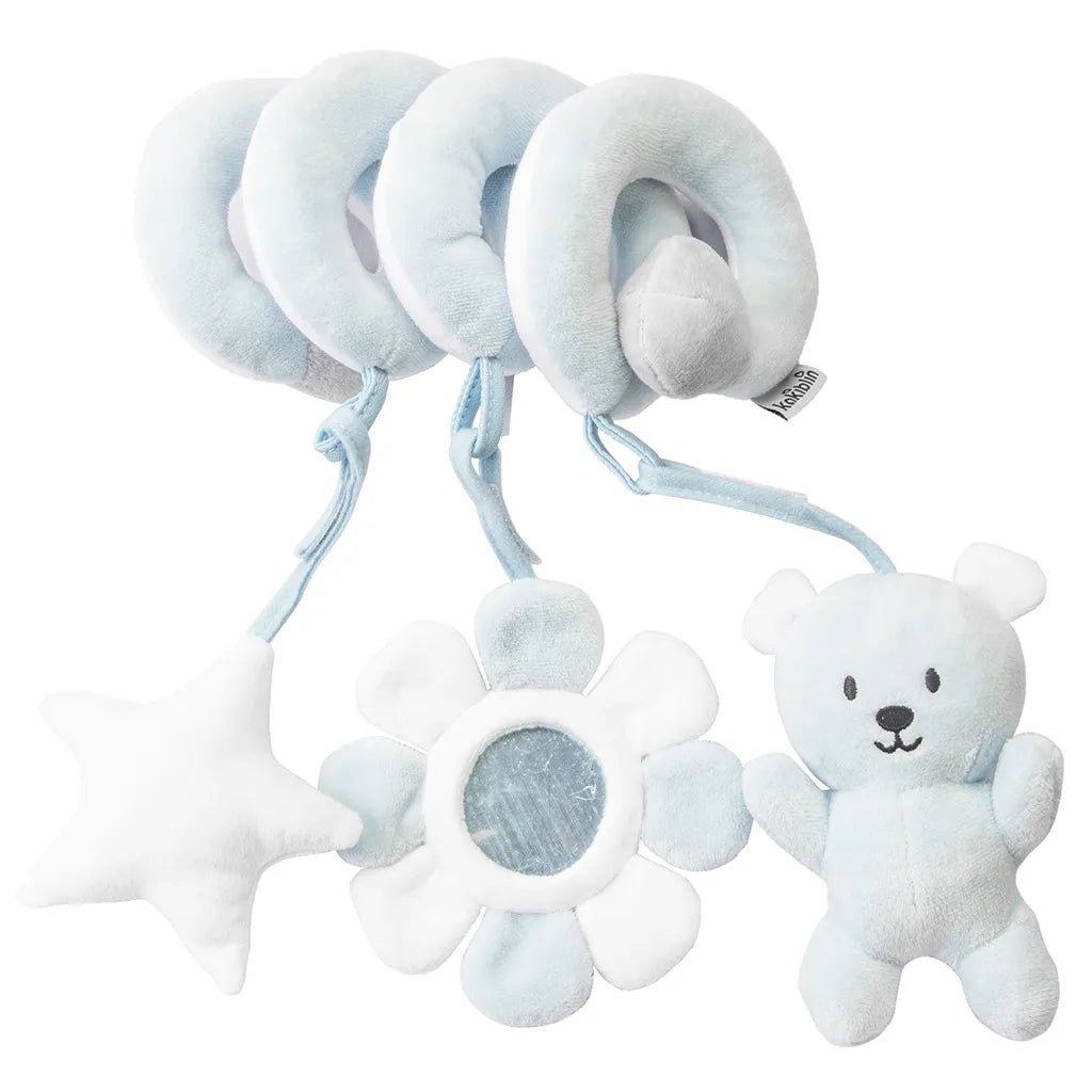 Baby's hand grasping a plush animal from the spiral activity toy, promoting motor skills