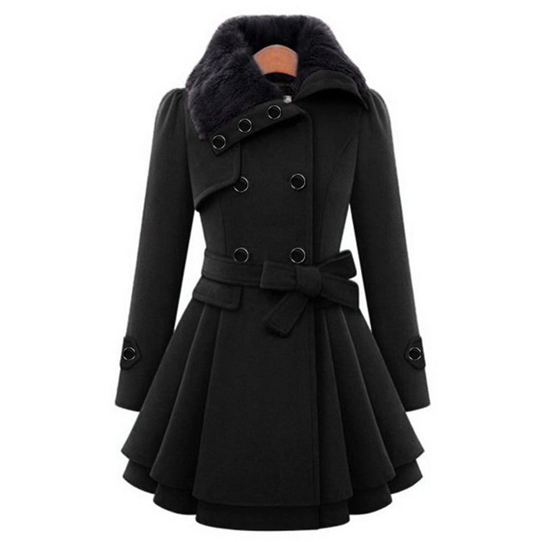 Fashionable women's plush tailored long coat, complete with an elegant faux fur collar; stylish outerwear.