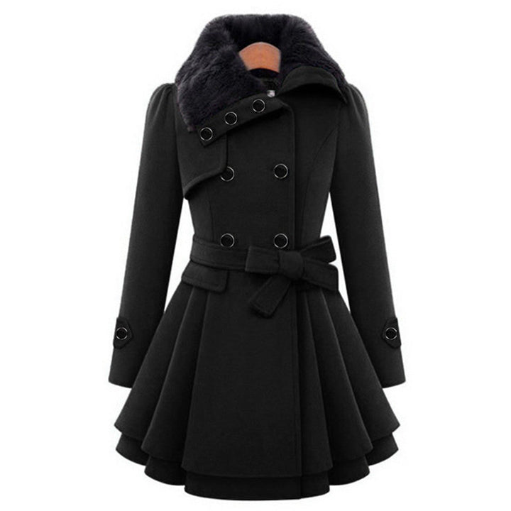Fashionable women's plush tailored long coat, complete with an elegant faux fur collar; stylish outerwear.