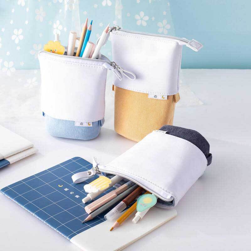 Student pop-up pencil case in soft pastel corduroy, perfect for school stationery.