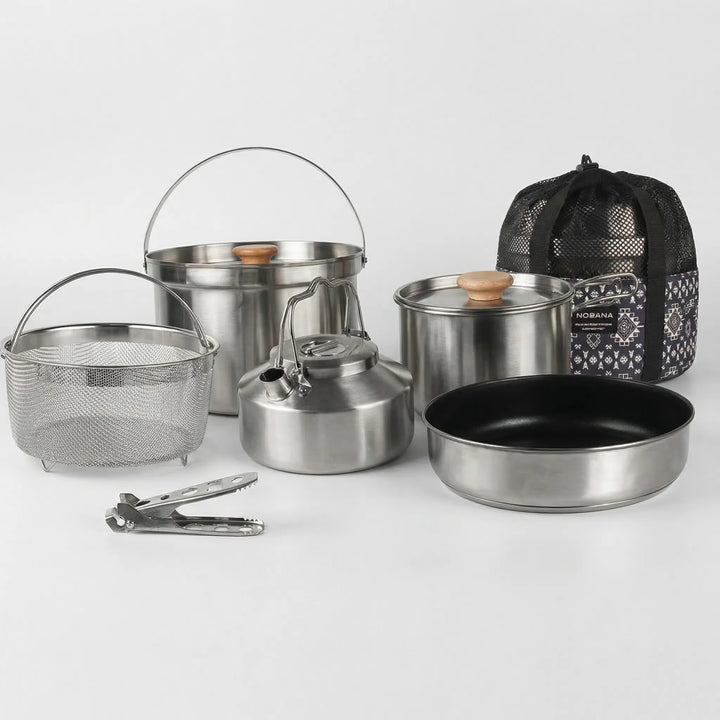 Adventure-ready 10-piece portable outdoor cookware. Durable stainless steel set for family camping & gourmet camp meals.