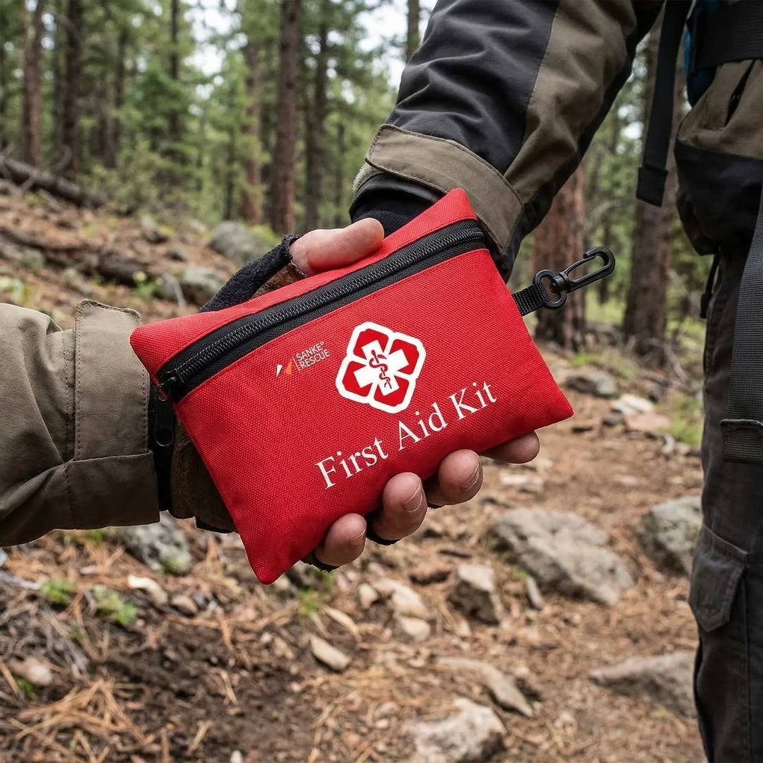 Portable 110-piece first aid kit for emergencies, travel, camping, and hiking safety.