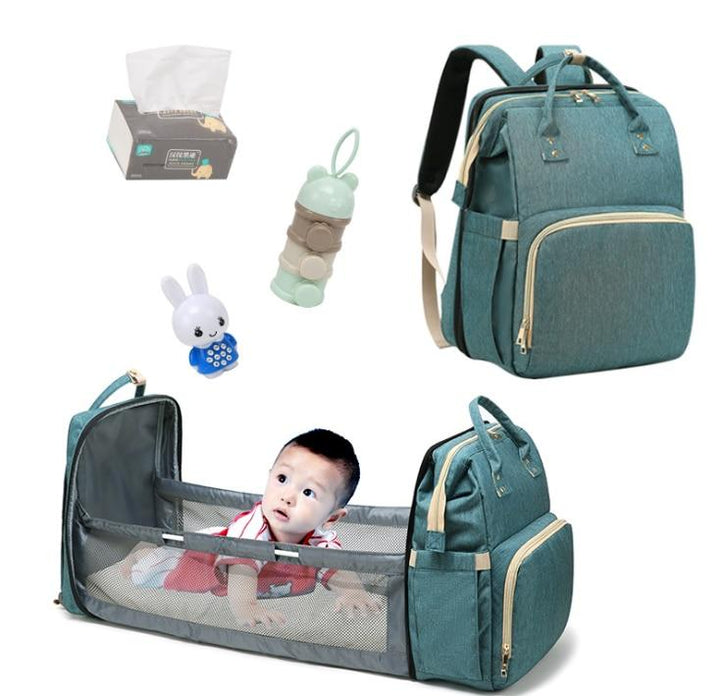 Portable 2-in-1 baby crib & diaper bag backpack for on-the-go parents. Travel bassinet and changing station.