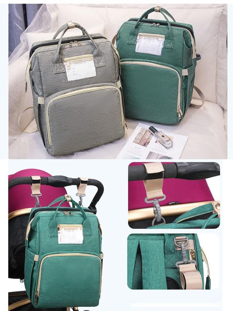 Waterproof baby backpack converts to a travel crib, includes changing station for on-the-go convenience.