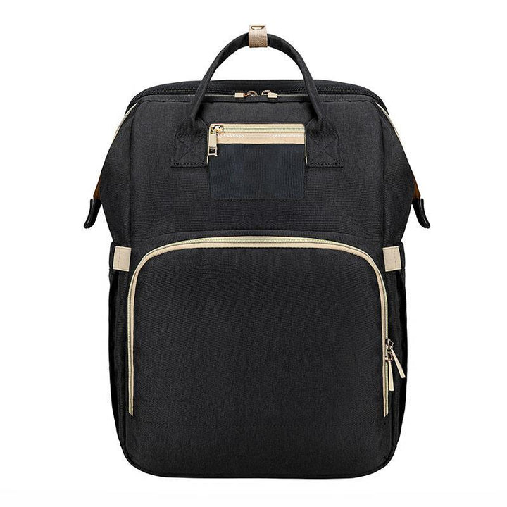 Multifunctional baby travel bag: converts to a safe infant crib with changing pad & storage for trips.
