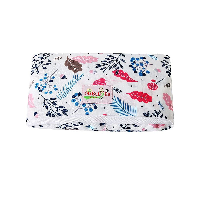 Travel-sized portable changing pad in a nursery setting, ready for daily baby care and quick changes.
