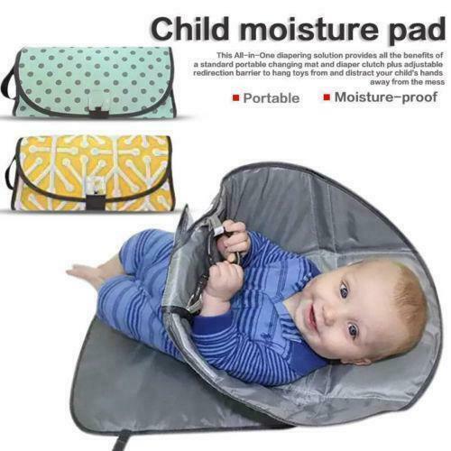 Folded portable baby changing pad, compact and waterproof, a must-have travel essential.