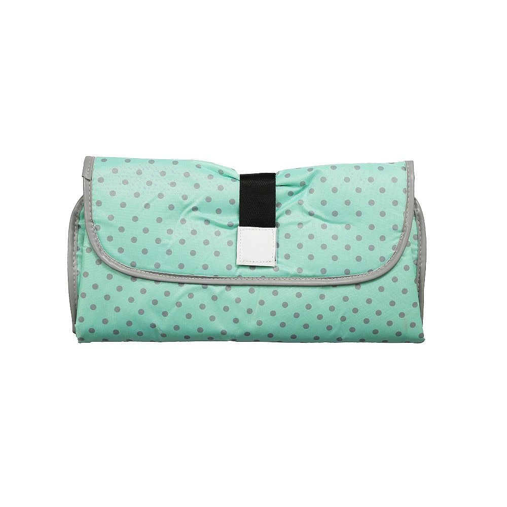 Side view of the portable changing pad, highlighting its slim design and travel-friendly features.