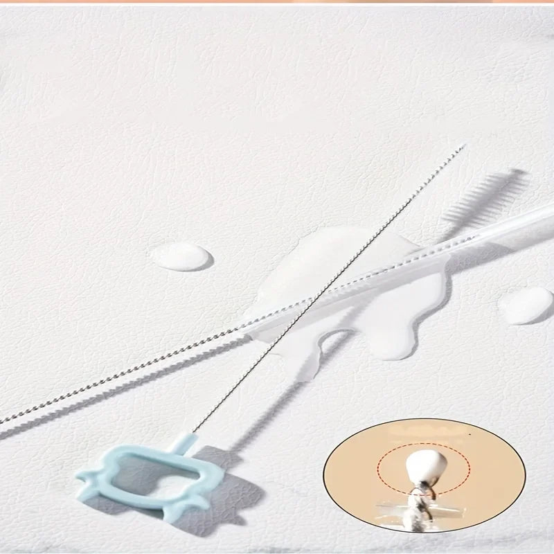 All components of the 6-in-1 baby bottle cleaning kit laid out, including brushes and drying rack.