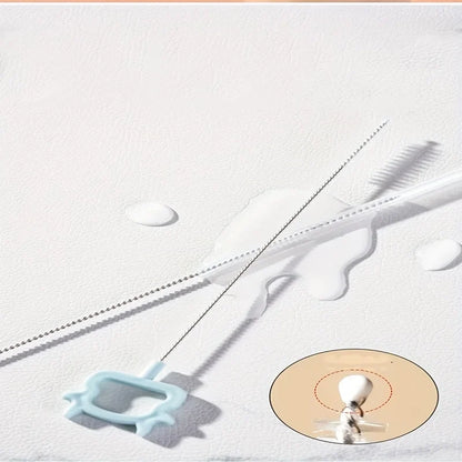 All components of the 6-in-1 baby bottle cleaning kit laid out, including brushes and drying rack.