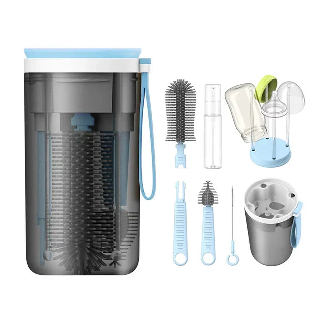 Portable baby bottle cleaning kit with brush, nipple cleaner, and drying rack for travel.
