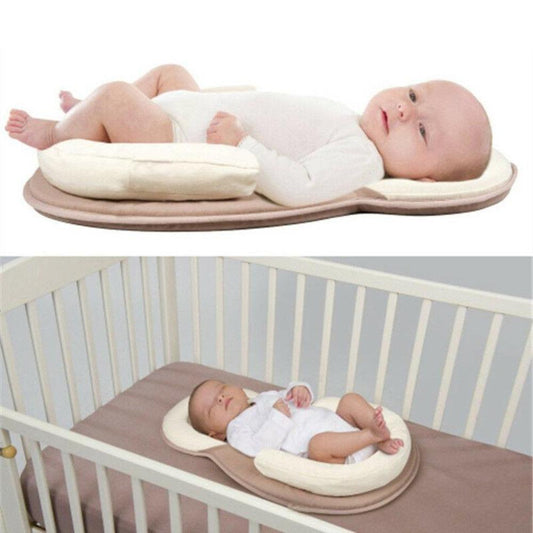 Portable baby sleep positioner and anti-roll bed for safe infant slumber and travel