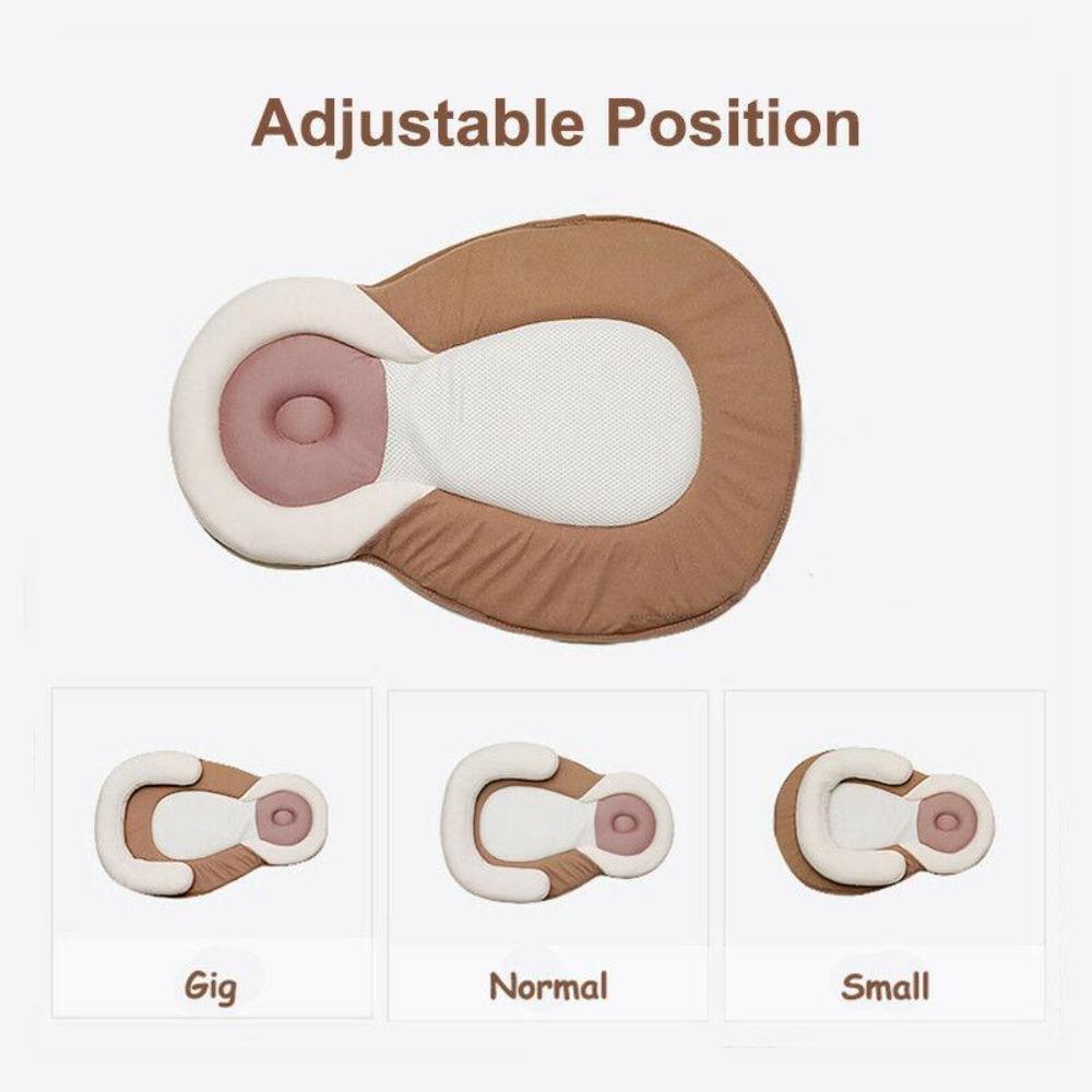 Infant sleep positioner with supportive bumpers ensures newborn safety and comfort