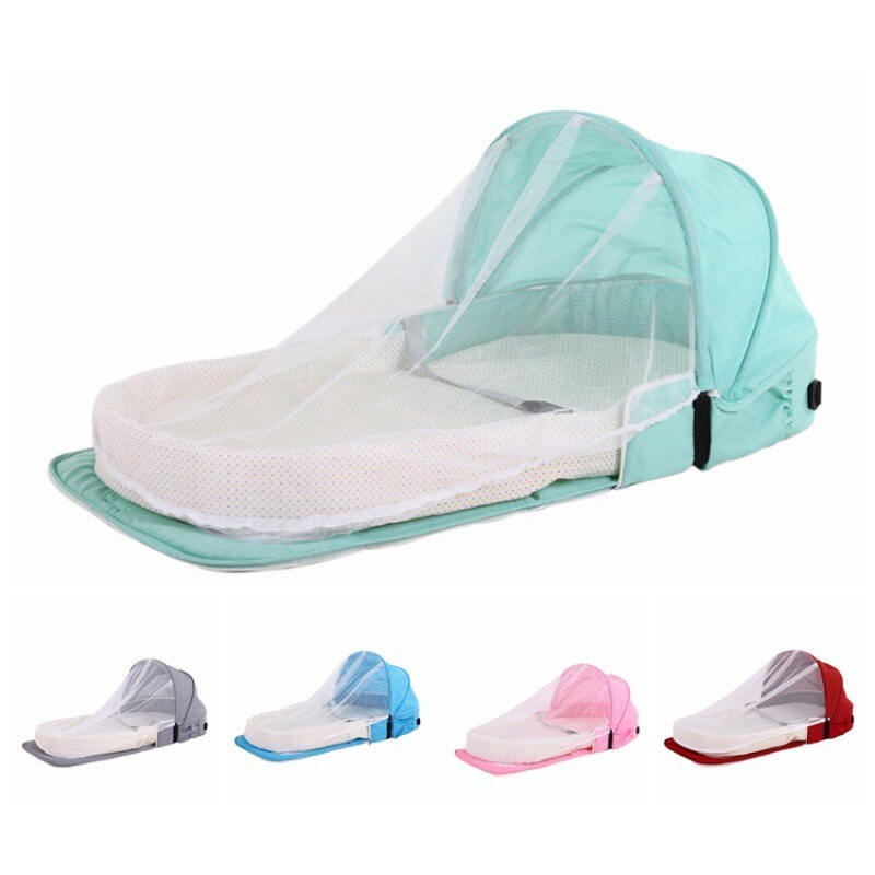 Portable baby travel crib with mosquito net & sun protection for safe outdoor sleep.