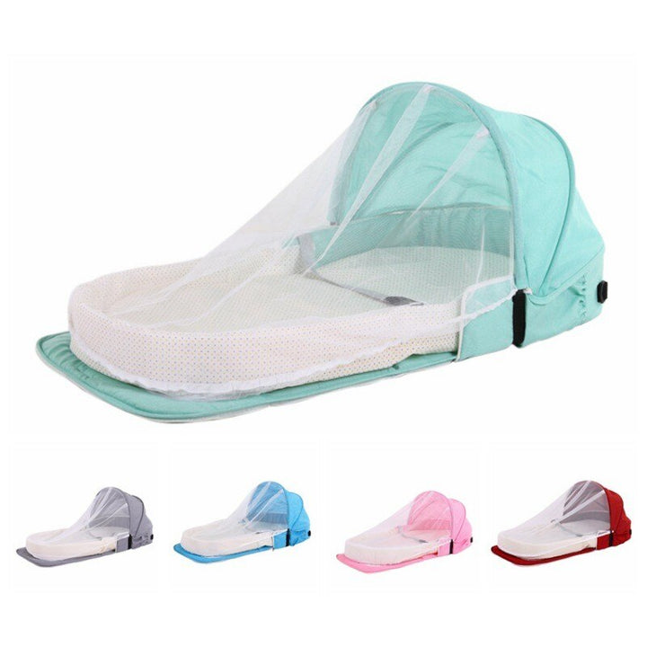 Portable baby travel crib with mosquito net & sun protection for safe outdoor sleep.
