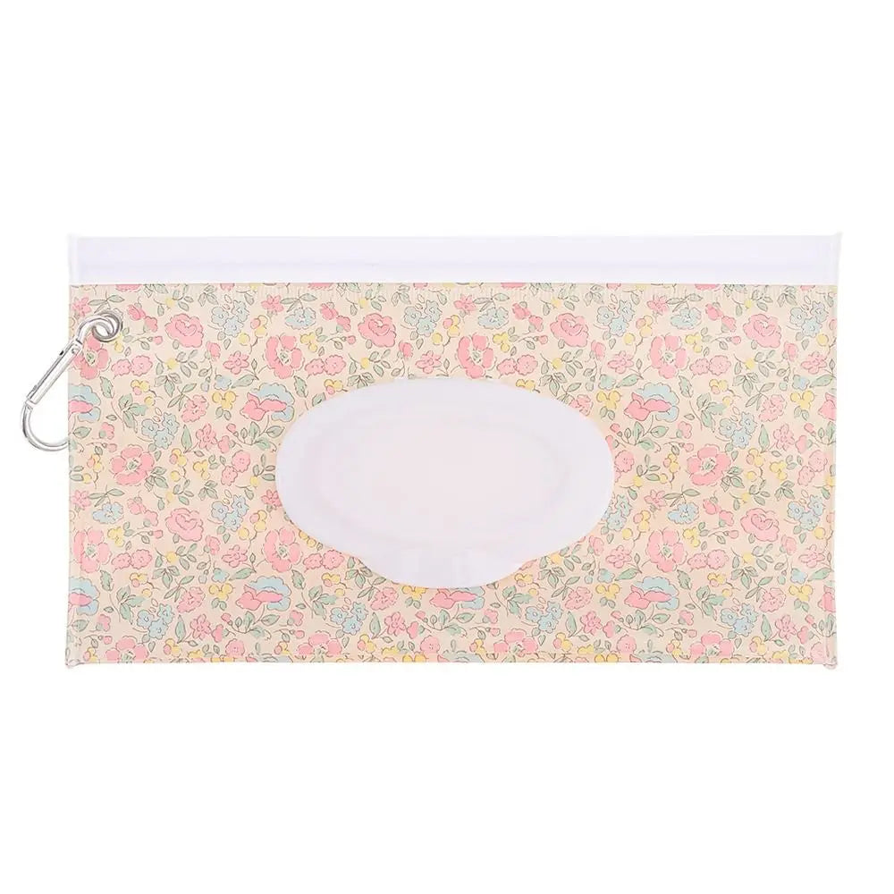 Baby accessory: portable wipe holder with flip top and snap to attach anywhere