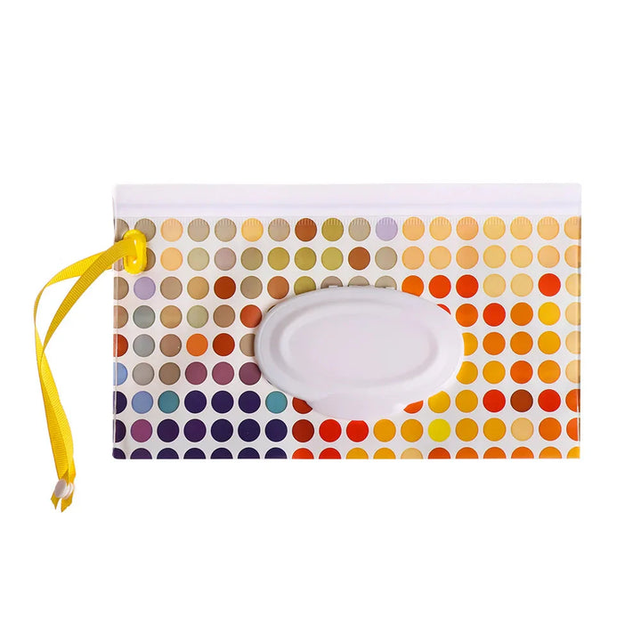 Stylish portable wet wipe dispenser, attaches to bags with a secure snap strap