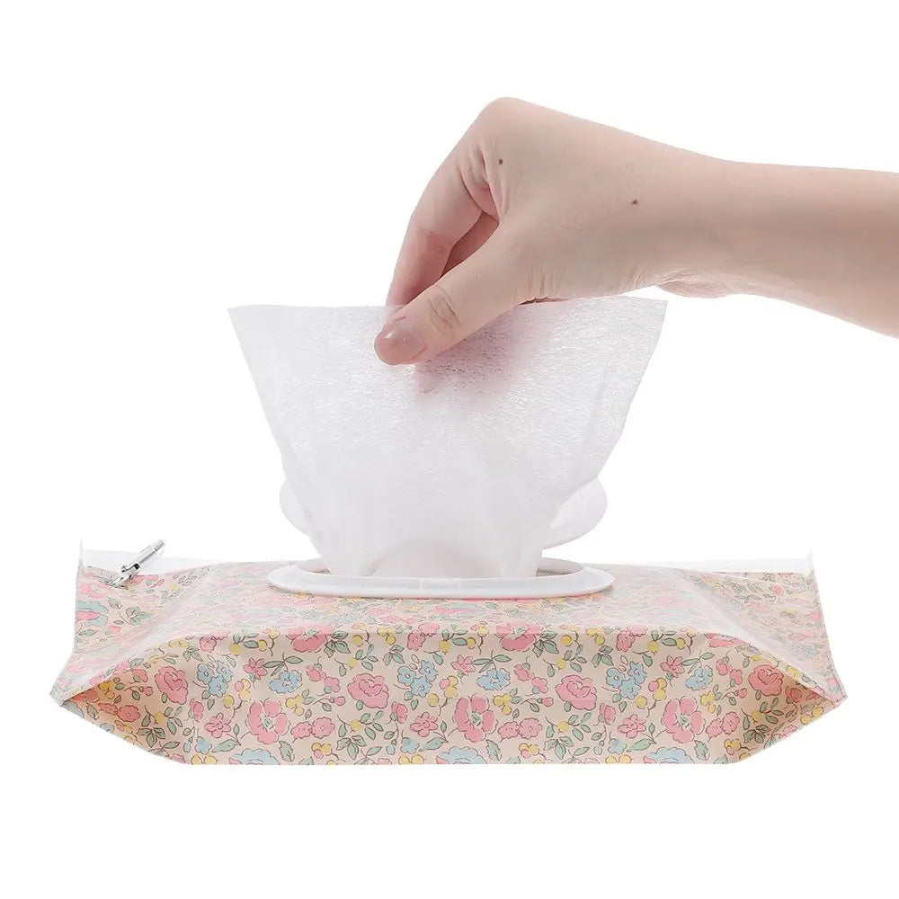 Baby travel wipe holder with secure flip top & snap closure, fits in any bag