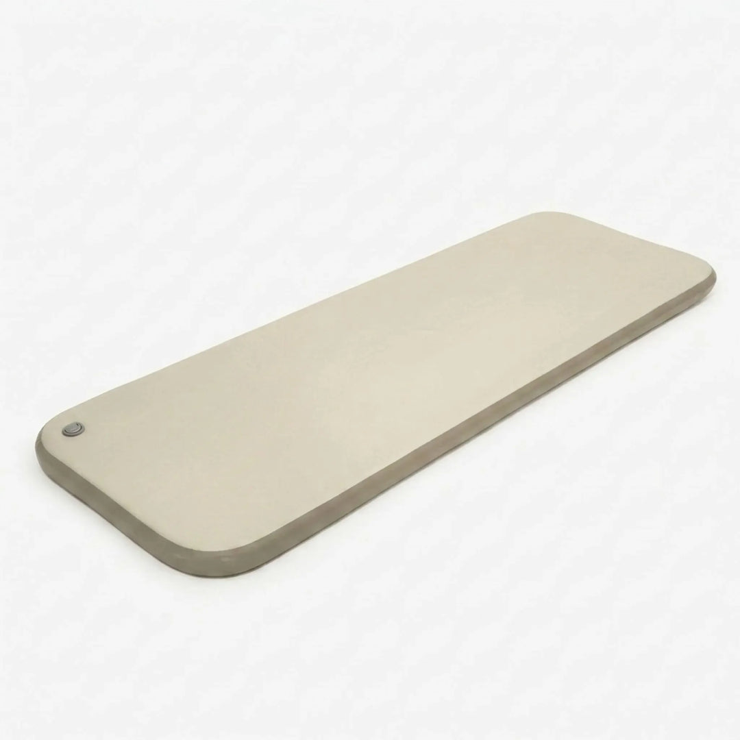 Inflatable camping air mattress provides comfy sleep for outdoor adventures, hiking, or a portable guest bed.