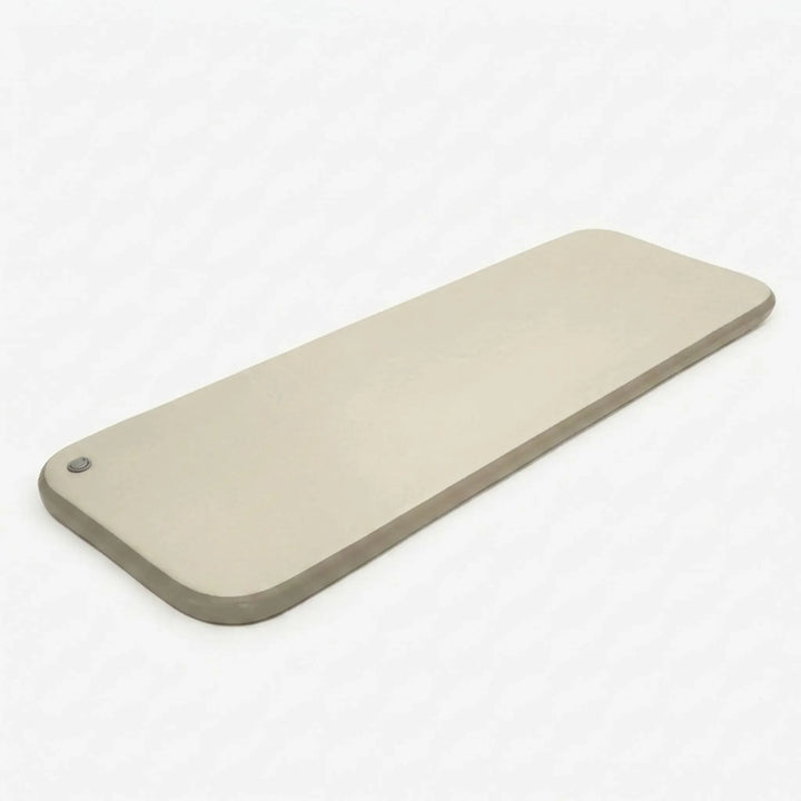 Inflatable camping air mattress provides comfy sleep for outdoor adventures, hiking, or a portable guest bed.