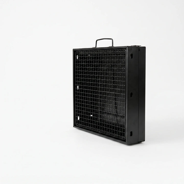Compact folding charcoal grill for camping & picnics. Portable outdoor cooking, ideal for any adventure.
