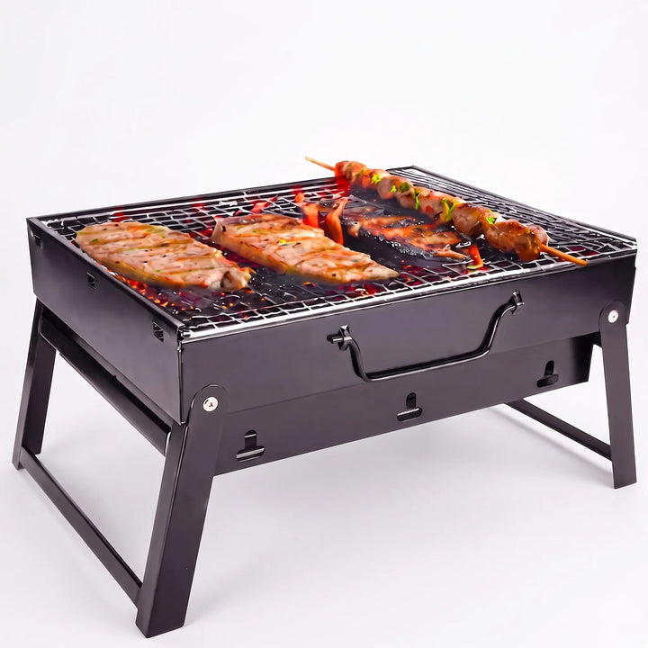 Steel portable charcoal BBQ grill with folding design. Perfect for outdoor gatherings, tailgating, & camping.