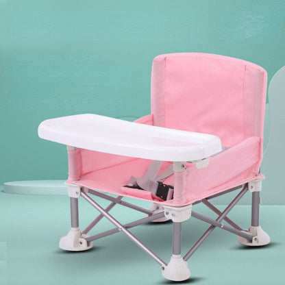 Portable children's camping dining chair with tray, perfect for outdoor meals and travel adventures.