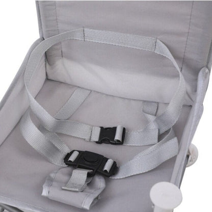 Child's travel camping chair with dining tray, ideal for an adventure-ready family.