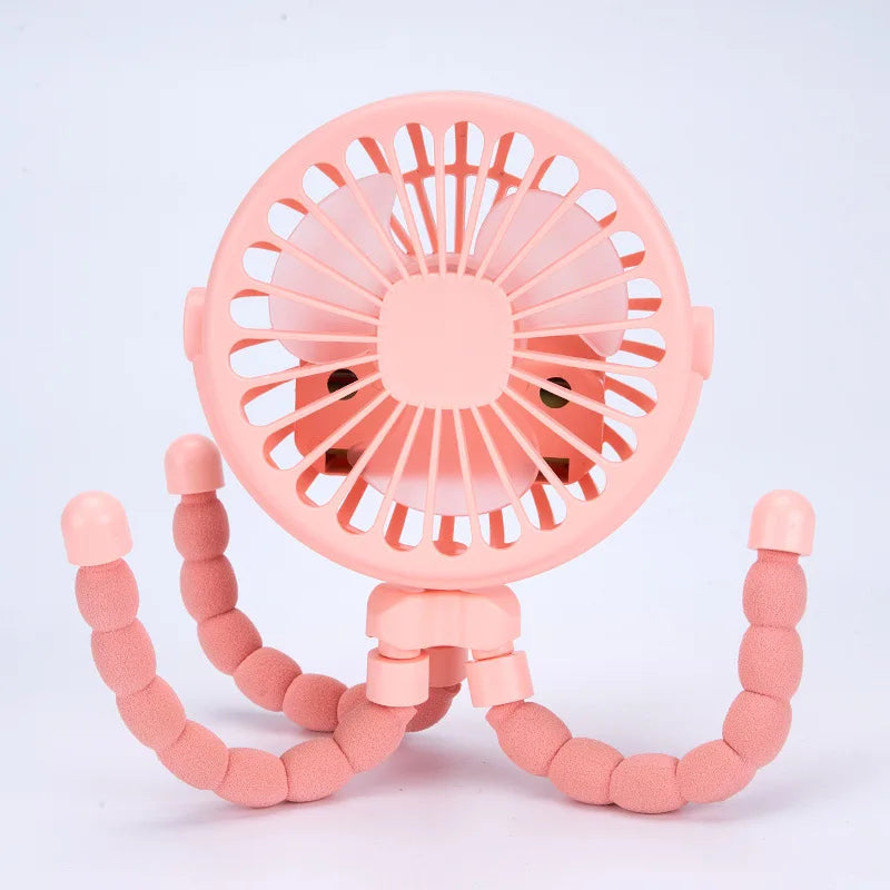 Versatile clip-on fan on a desk, highlighting its use beyond strollers, for home or office.