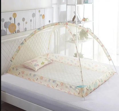 White mesh portable baby bed with mosquito net, providing essential protection and comfort for infants.