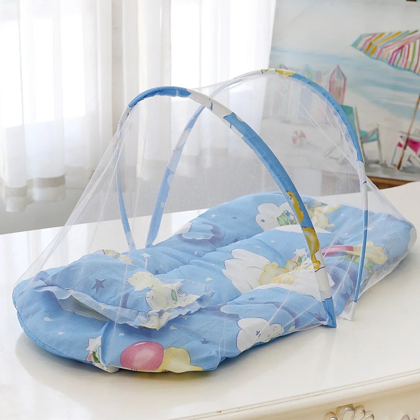 Portable foldable baby mosquito net for cribs & playpens, offering insect protection for infants.
