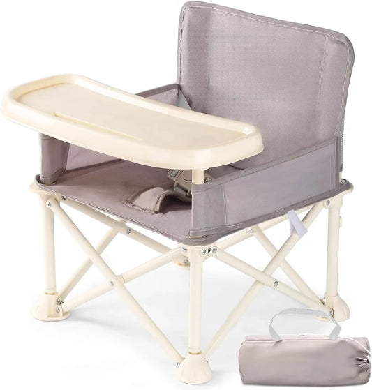 Portable folding travel high chair with detachable tray, perfect for baby feeding on the go.