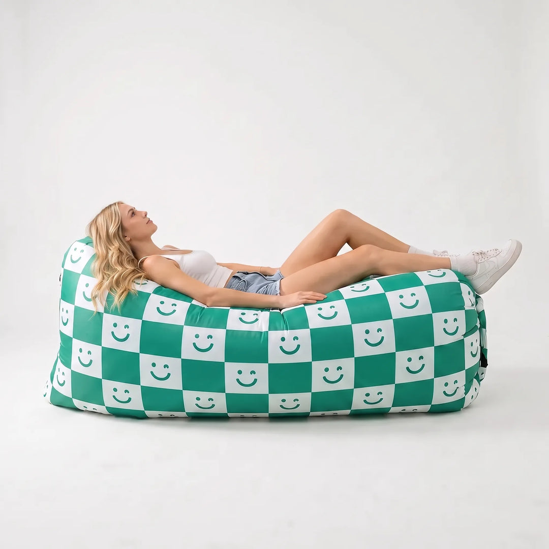 Relaxing inflatable air couch, perfect as a beach chair or portable lounger for seaside comfort.