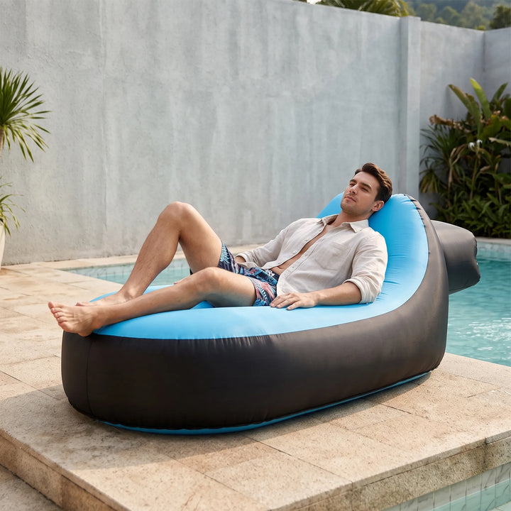 Portable inflatable lounger for outdoor relaxation, comfy air sofa perfect for beach, camping, garden.