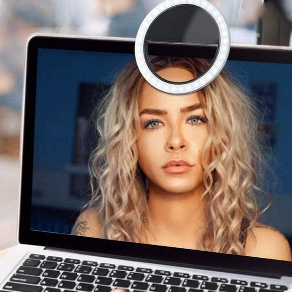 Universal LED ring light, portable, USB rechargeable, for smartphone, laptop, content creation & video calls.